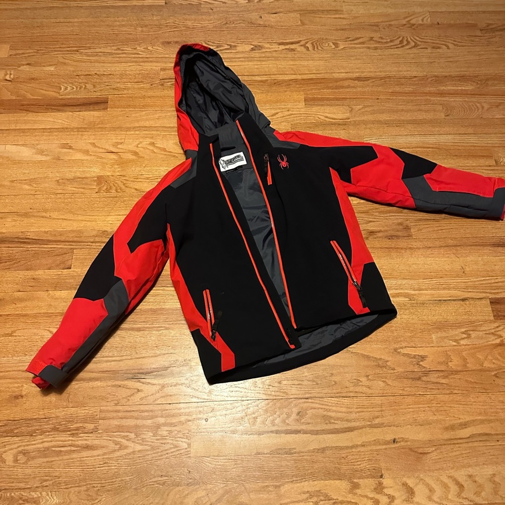 worn only a handful of time…perfect condition, no rips or stains.  Zip off hood